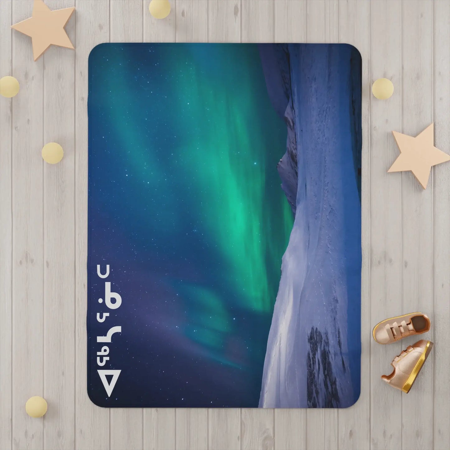 ᐊᖅᓴᕐᓃᑦ (Football Players) Northern Lights Toddler Blanket
